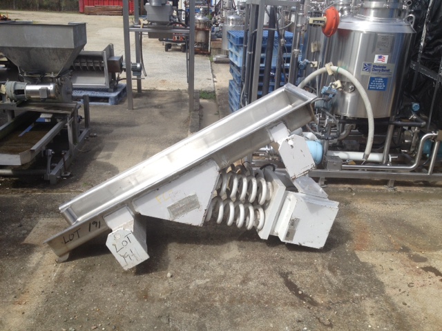 used Carrier Vibrating Ampli Flow Pan feeder. Model FC1860S-6. Has Sanitary Stainless steel pan 6' lgth x 18